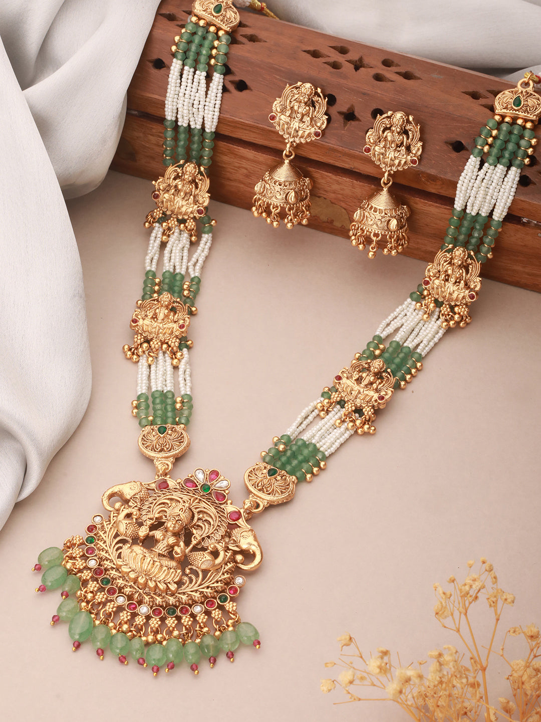 Gold Plated Green Pearl Beaded Lakshmi Motif Long haram Temple Jeellery Set